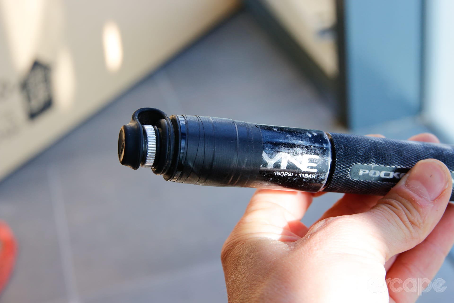 Lezyone pocket drive mini pump with electrical tape wrapped around it